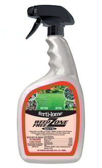 A spray bottle of Fertilome Weed Free Zone spray for killing weeds.