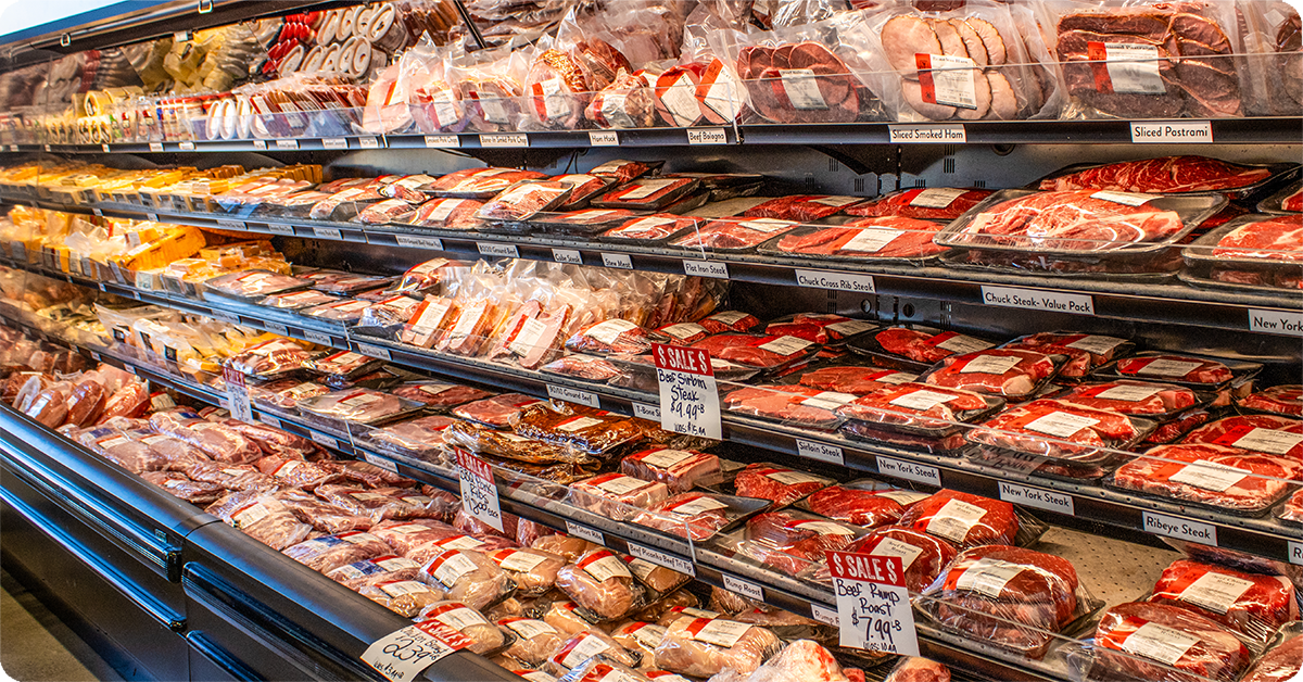 A refrigerated shelf filled with premium, ethically sourced Bar W beef.