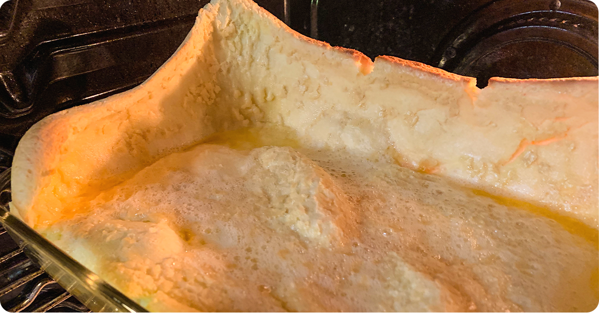 German Pancakes rising inside of an oven.